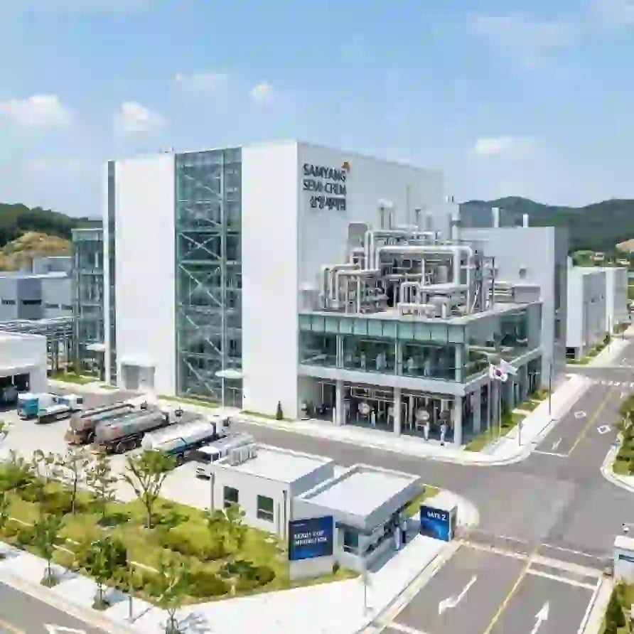 Semiconductor manufacturing facility in South Korea with modern architecture and production equipment.